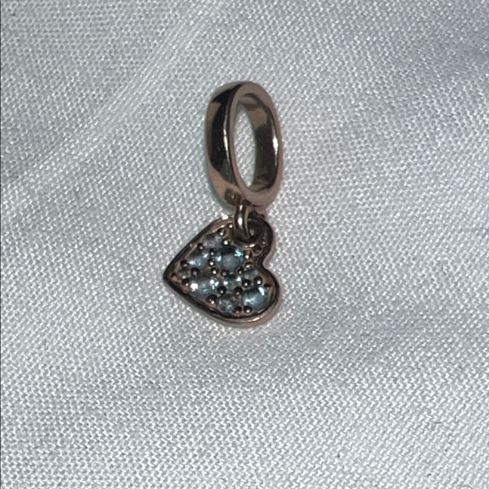Pandora rose gold plated tilted heart charm with pave light blue crystals